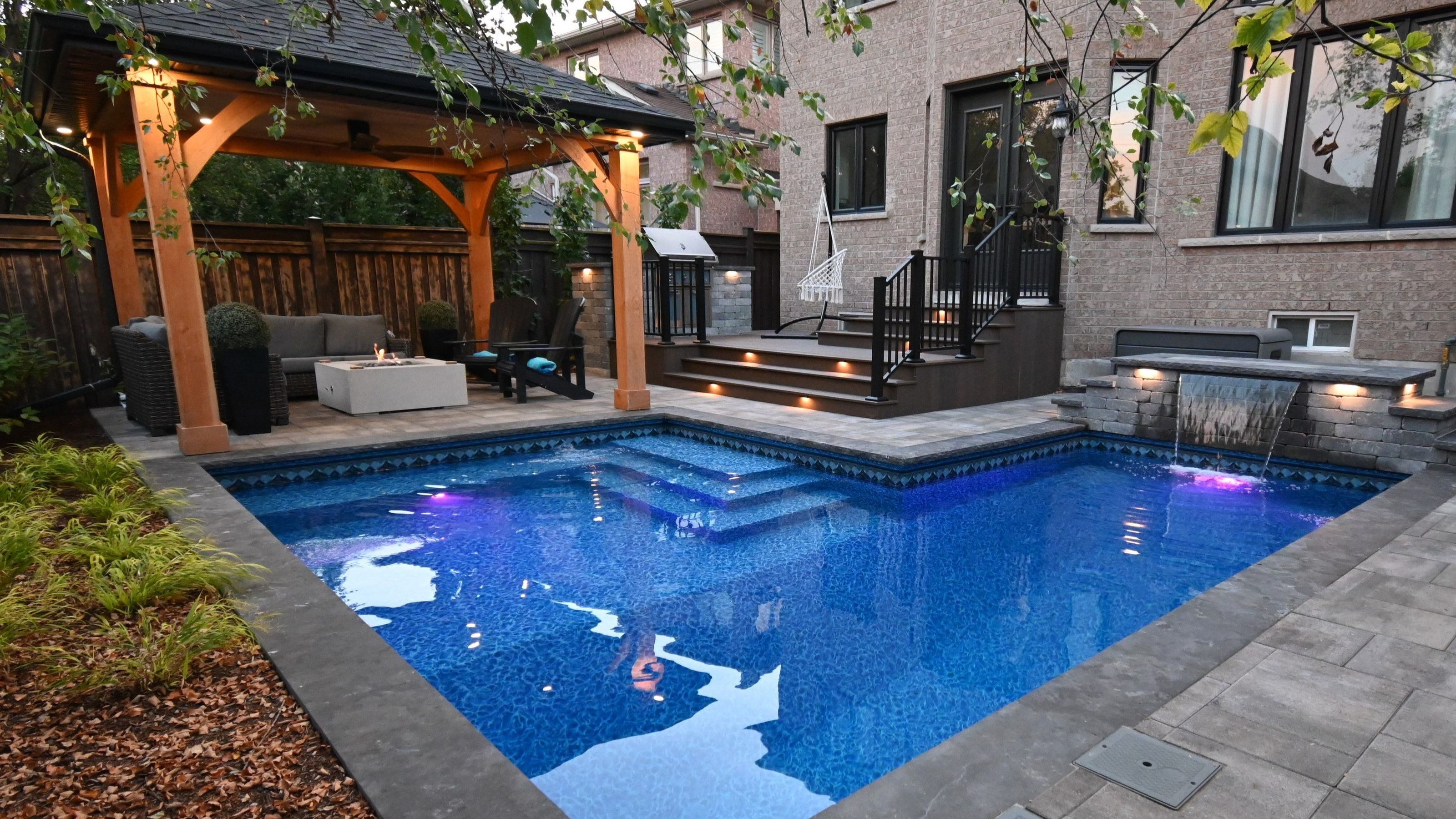 Cozy outdoor space with ambient landscape lighting