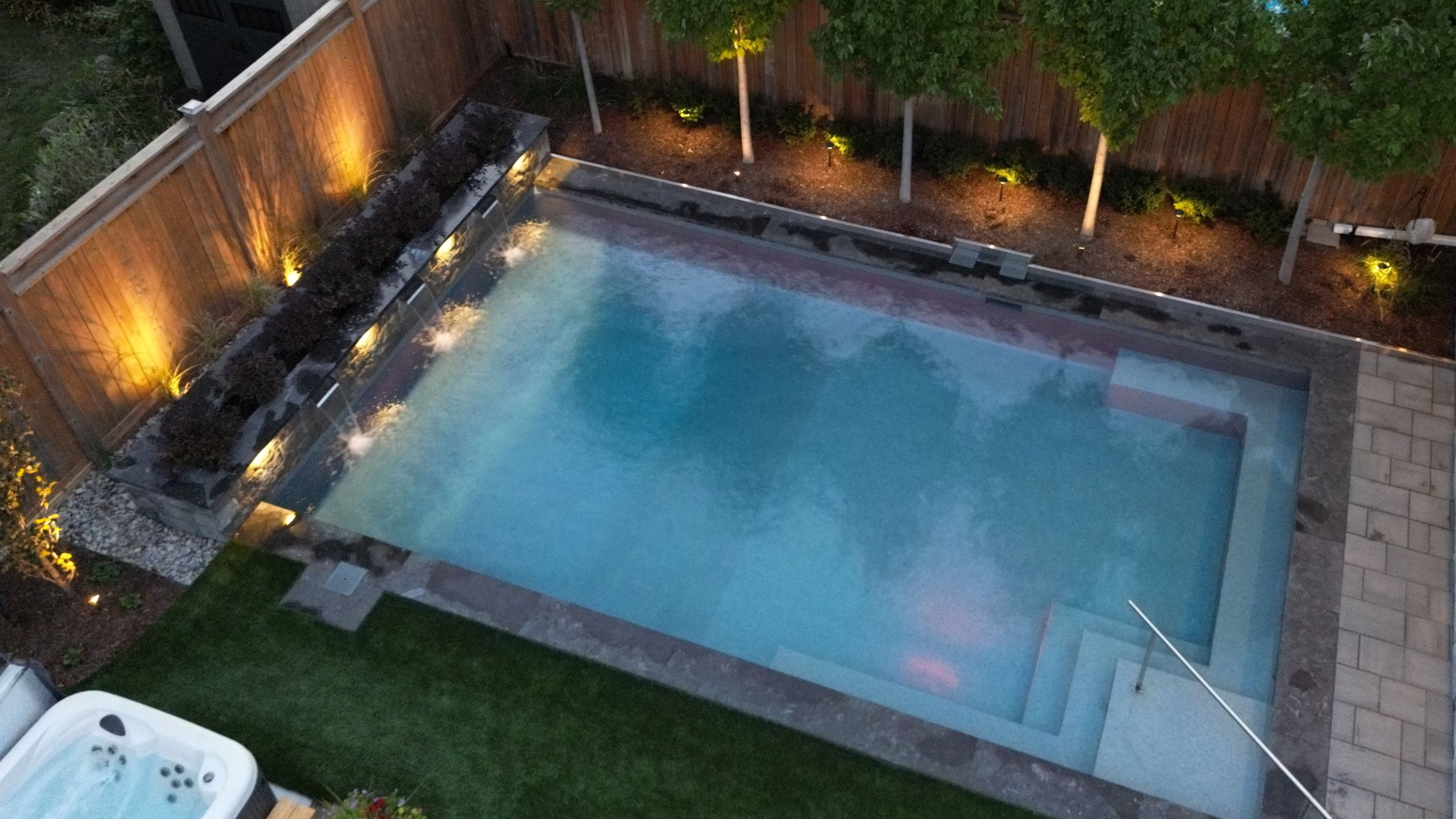 Overhead landscape lighting features