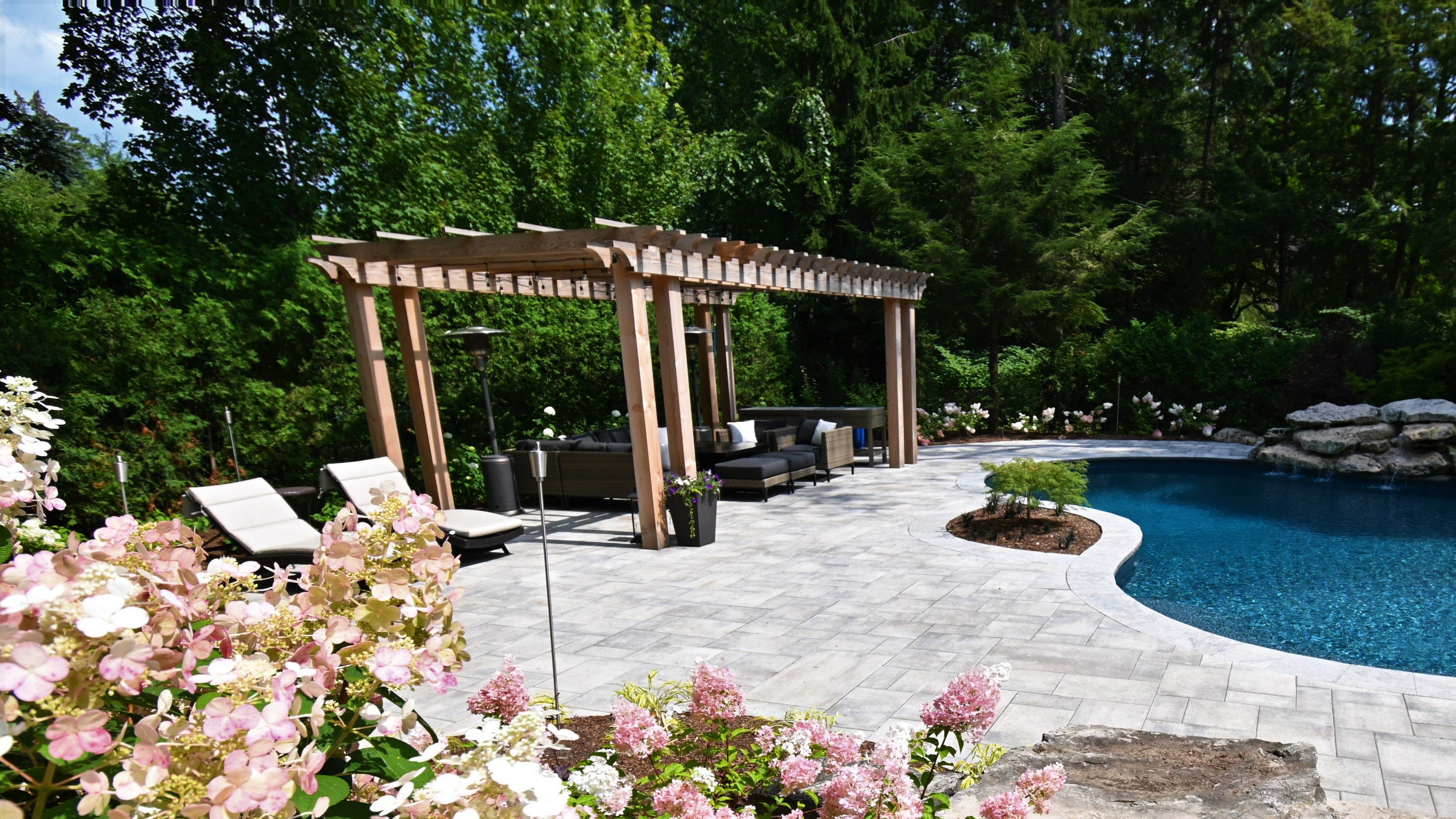 Modern shade structure with glass panels