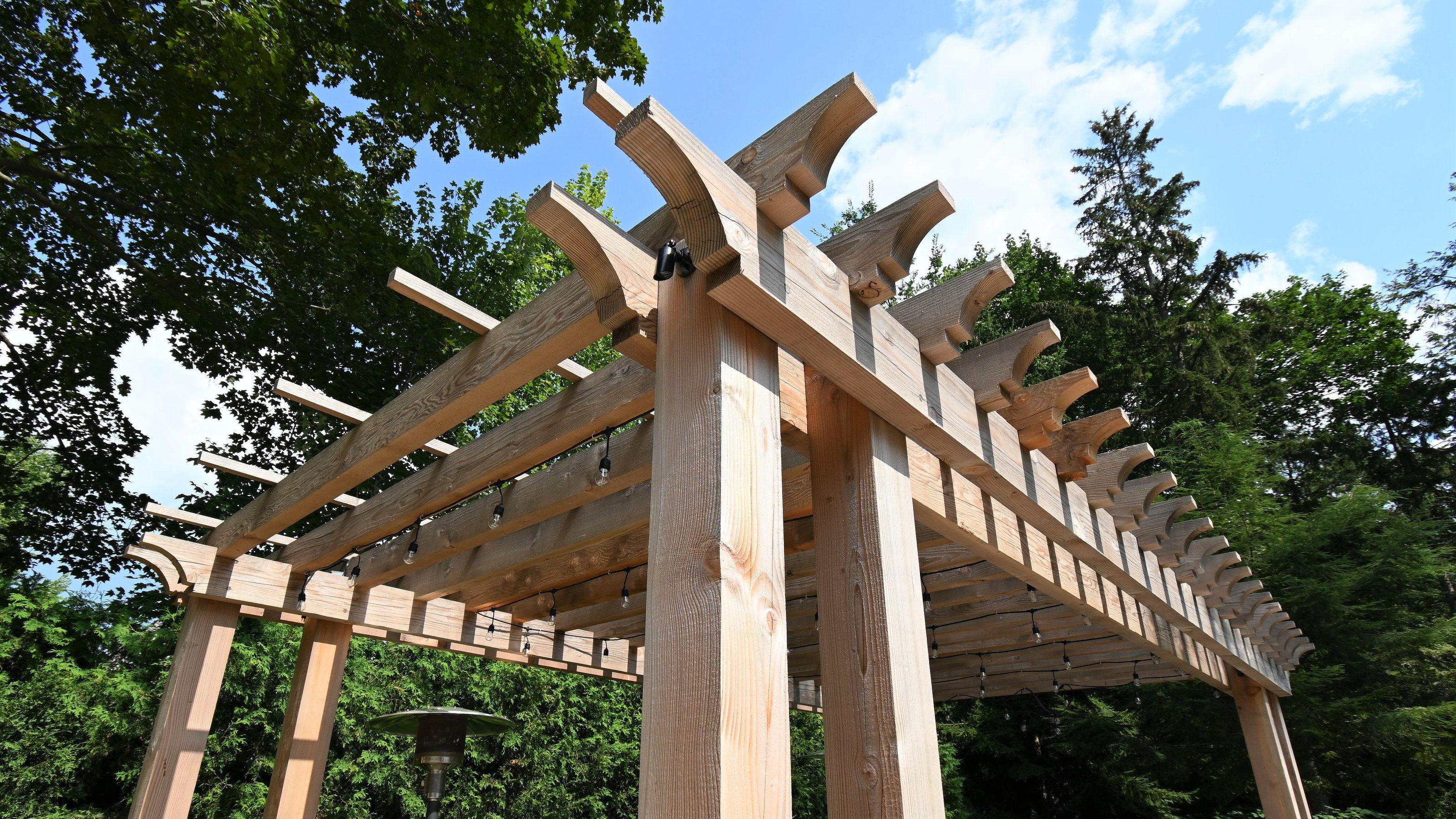 Custom gazebo with retractable shade system