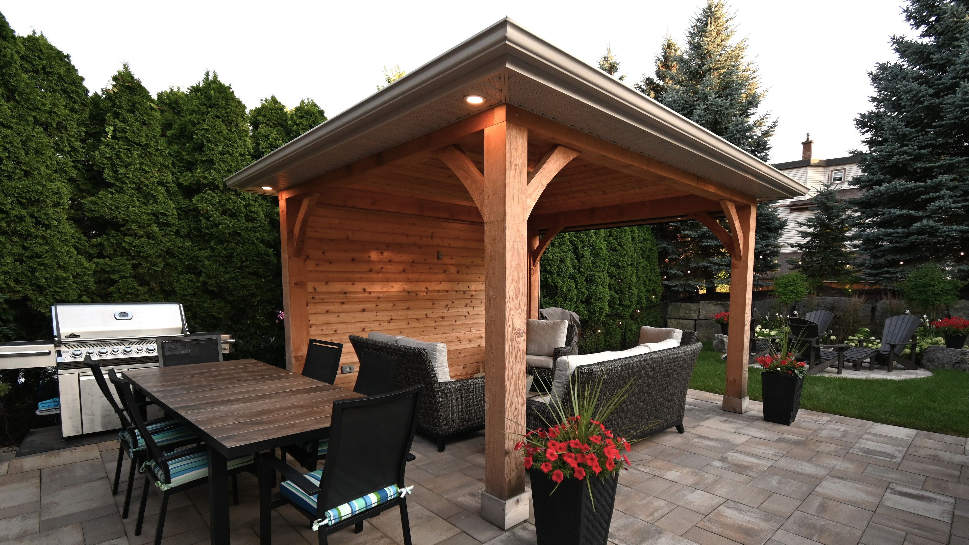 Contemporary shade structure with integrated seating